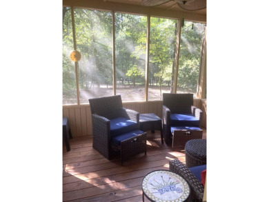 Situated on a hill, this one owner, two lot home allows for the on Holly Lake Ranch Golf Club in Texas - for sale on GolfHomes.com, golf home, golf lot