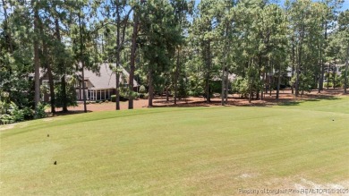 GORGEOUS, GOLF FRONT LIVING IN PINEWILD! Perfectly positioned on on Pinewild Country Club of Pinehurst in North Carolina - for sale on GolfHomes.com, golf home, golf lot