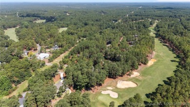 GORGEOUS, GOLF FRONT LIVING IN PINEWILD! Perfectly positioned on on Pinewild Country Club of Pinehurst in North Carolina - for sale on GolfHomes.com, golf home, golf lot