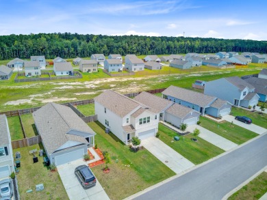 Welcome to this beautifully designed 5-bedroom, 3-bath home on Cypress Point Par 3 in South Carolina - for sale on GolfHomes.com, golf home, golf lot