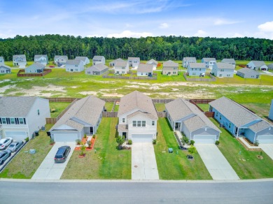 Welcome to this beautifully designed 5-bedroom, 3-bath home on Cypress Point Par 3 in South Carolina - for sale on GolfHomes.com, golf home, golf lot
