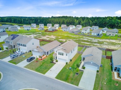 Welcome to this beautifully designed 5-bedroom, 3-bath home on Cypress Point Par 3 in South Carolina - for sale on GolfHomes.com, golf home, golf lot