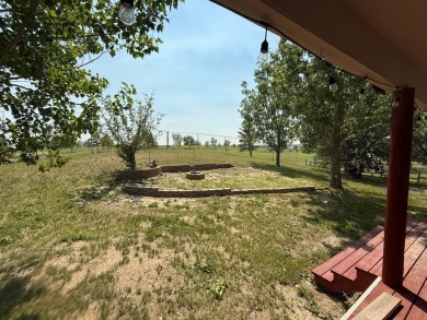 Welcome to this stunning 4-bedroom, 4-bathroom home nestled on Sidney Country Club in Montana - for sale on GolfHomes.com, golf home, golf lot