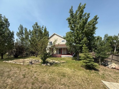 Welcome to this stunning 4-bedroom, 4-bathroom home nestled on Sidney Country Club in Montana - for sale on GolfHomes.com, golf home, golf lot