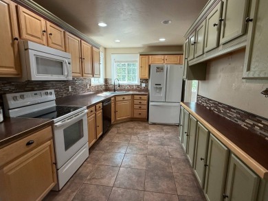 Welcome to this stunning 4-bedroom, 4-bathroom home nestled on Sidney Country Club in Montana - for sale on GolfHomes.com, golf home, golf lot