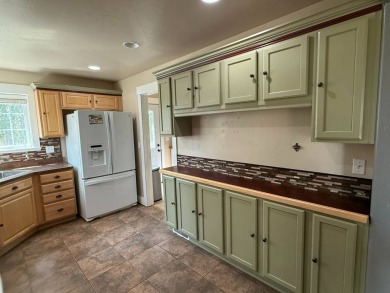 Welcome to this stunning 4-bedroom, 4-bathroom home nestled on Sidney Country Club in Montana - for sale on GolfHomes.com, golf home, golf lot