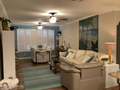Elegantly updated and remodeled 1st story end unit with private on Windsor Parke Golf Club in Florida - for sale on GolfHomes.com, golf home, golf lot