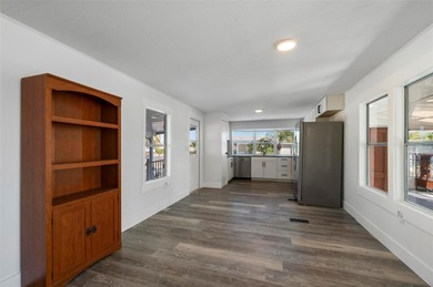 Welcome to this beautifully updated 2-bedroom, 2-bath home on Kings Gate Golf Club in Florida - for sale on GolfHomes.com, golf home, golf lot