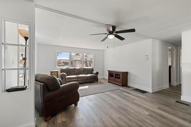 Welcome to this beautifully updated 2-bedroom, 2-bath home on Kings Gate Golf Club in Florida - for sale on GolfHomes.com, golf home, golf lot