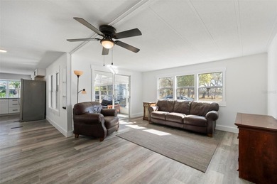 Welcome to this beautifully updated 2-bedroom, 2-bath home on Kings Gate Golf Club in Florida - for sale on GolfHomes.com, golf home, golf lot