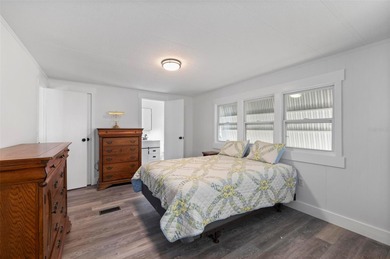 Welcome to this beautifully updated 2-bedroom, 2-bath home on Kings Gate Golf Club in Florida - for sale on GolfHomes.com, golf home, golf lot