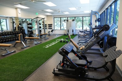 Move-in ready, top-floor residence in Eastgate with spectacular on Hunters Run Golf and Country Club in Florida - for sale on GolfHomes.com, golf home, golf lot