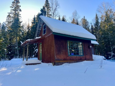 HERE'S A CHANCE to own a cabin on the Saddleback Mountain Road on Evergreen Golf Club in Maine - for sale on GolfHomes.com, golf home, golf lot