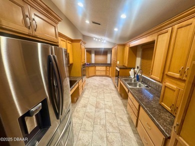 WOW!  JUST REDUCED by $17,469! WHEELCHAIR ACCESSIBLE KITCHEN AND on Indigo Lakes Golf Club in Florida - for sale on GolfHomes.com, golf home, golf lot