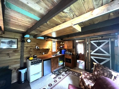 HERE'S A CHANCE to own a cabin on the Saddleback Mountain Road on Evergreen Golf Club in Maine - for sale on GolfHomes.com, golf home, golf lot