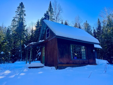 HERE'S A CHANCE to own a cabin on the Saddleback Mountain Road on Evergreen Golf Club in Maine - for sale on GolfHomes.com, golf home, golf lot