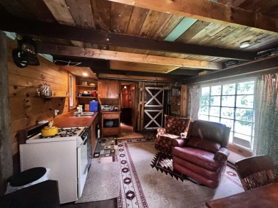 HERE'S A CHANCE to own a cabin on the Saddleback Mountain Road on Evergreen Golf Club in Maine - for sale on GolfHomes.com, golf home, golf lot