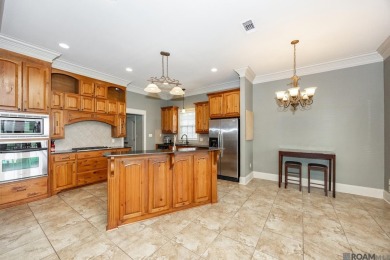 Located on the golf course and water with a new roof and on Copper Mill Golf Club in Louisiana - for sale on GolfHomes.com, golf home, golf lot