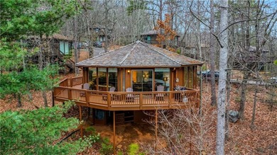 TREETOPPER *BLESSINGS* These octagonal shaped homes with floor on Big Canoe Golf Club - Cherokee in Georgia - for sale on GolfHomes.com, golf home, golf lot