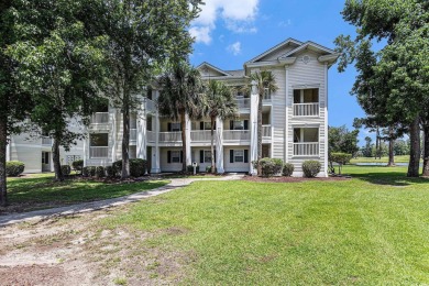 This spacious and well-maintained first-floor end unit features on River Oaks Golf Plantation  in South Carolina - for sale on GolfHomes.com, golf home, golf lot