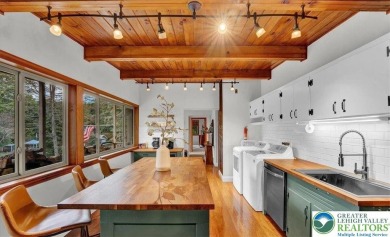 Step into this 3-bedroom, 2-bath Lake Harmony home showcasing on Split Rock Resort and Country Club in Pennsylvania - for sale on GolfHomes.com, golf home, golf lot