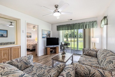 This spacious and well-maintained first-floor end unit features on River Oaks Golf Plantation  in South Carolina - for sale on GolfHomes.com, golf home, golf lot
