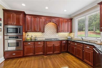 This meticulously maintained gorgeous all brick executive home on Royal Lakes Golf and Country Club in Georgia - for sale on GolfHomes.com, golf home, golf lot