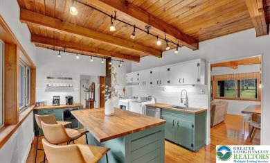 Step into this 3-bedroom, 2-bath Lake Harmony home showcasing on Split Rock Resort and Country Club in Pennsylvania - for sale on GolfHomes.com, golf home, golf lot