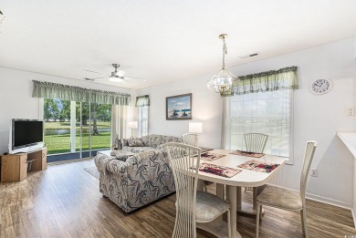 This spacious and well-maintained first-floor end unit features on River Oaks Golf Plantation  in South Carolina - for sale on GolfHomes.com, golf home, golf lot