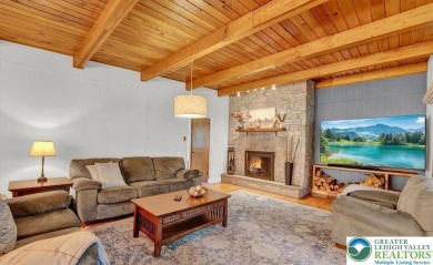 Step into this 3-bedroom, 2-bath Lake Harmony home showcasing on Split Rock Resort and Country Club in Pennsylvania - for sale on GolfHomes.com, golf home, golf lot