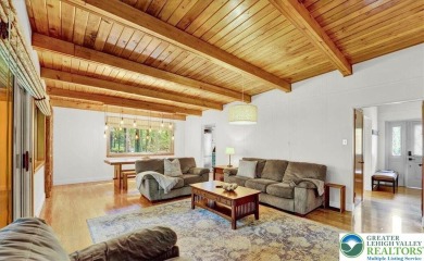 Step into this 3-bedroom, 2-bath Lake Harmony home showcasing on Split Rock Resort and Country Club in Pennsylvania - for sale on GolfHomes.com, golf home, golf lot