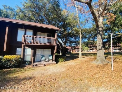 One of the best golf course views in this recently updated one on Diamondhead Country Club in Mississippi - for sale on GolfHomes.com, golf home, golf lot