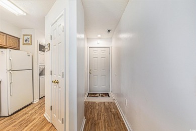This spacious and well-maintained first-floor end unit features on River Oaks Golf Plantation  in South Carolina - for sale on GolfHomes.com, golf home, golf lot