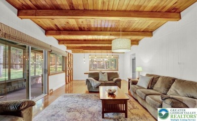 Step into this 3-bedroom, 2-bath Lake Harmony home showcasing on Split Rock Resort and Country Club in Pennsylvania - for sale on GolfHomes.com, golf home, golf lot