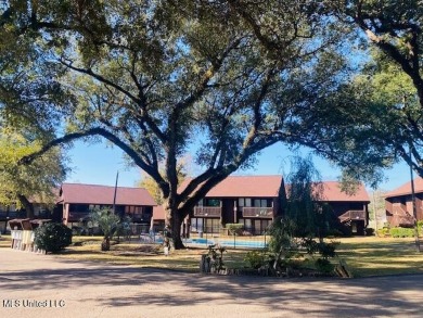 One of the best golf course views in this recently updated one on Diamondhead Country Club in Mississippi - for sale on GolfHomes.com, golf home, golf lot