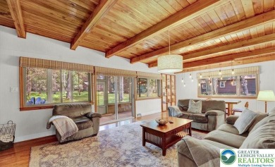 Step into this 3-bedroom, 2-bath Lake Harmony home showcasing on Split Rock Resort and Country Club in Pennsylvania - for sale on GolfHomes.com, golf home, golf lot