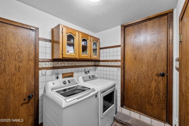 This one-of-a-kind custom home in Flagstaff's Continental on Continental Country Club in Arizona - for sale on GolfHomes.com, golf home, golf lot