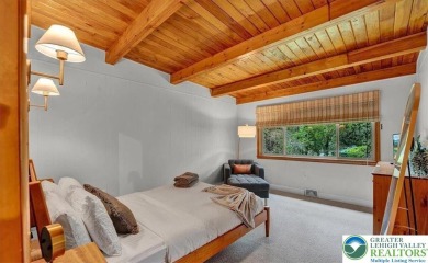 Step into this 3-bedroom, 2-bath Lake Harmony home showcasing on Split Rock Resort and Country Club in Pennsylvania - for sale on GolfHomes.com, golf home, golf lot