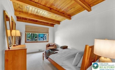 Step into this 3-bedroom, 2-bath Lake Harmony home showcasing on Split Rock Resort and Country Club in Pennsylvania - for sale on GolfHomes.com, golf home, golf lot
