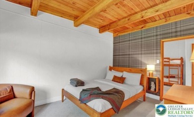 Step into this 3-bedroom, 2-bath Lake Harmony home showcasing on Split Rock Resort and Country Club in Pennsylvania - for sale on GolfHomes.com, golf home, golf lot