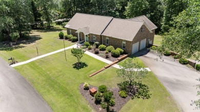 Need room for that car collection? This stunning custom-built on Santee National Golf Course in South Carolina - for sale on GolfHomes.com, golf home, golf lot