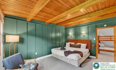 Step into this 3-bedroom, 2-bath Lake Harmony home showcasing on Split Rock Resort and Country Club in Pennsylvania - for sale on GolfHomes.com, golf home, golf lot