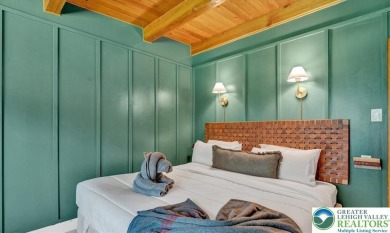 Step into this 3-bedroom, 2-bath Lake Harmony home showcasing on Split Rock Resort and Country Club in Pennsylvania - for sale on GolfHomes.com, golf home, golf lot