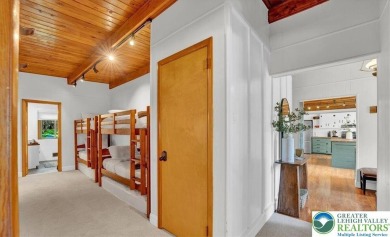 Step into this 3-bedroom, 2-bath Lake Harmony home showcasing on Split Rock Resort and Country Club in Pennsylvania - for sale on GolfHomes.com, golf home, golf lot