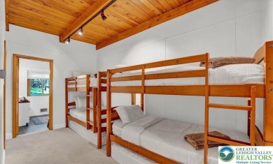Step into this 3-bedroom, 2-bath Lake Harmony home showcasing on Split Rock Resort and Country Club in Pennsylvania - for sale on GolfHomes.com, golf home, golf lot