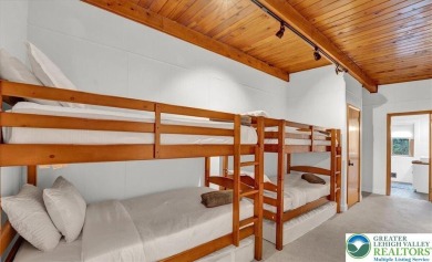 Step into this 3-bedroom, 2-bath Lake Harmony home showcasing on Split Rock Resort and Country Club in Pennsylvania - for sale on GolfHomes.com, golf home, golf lot