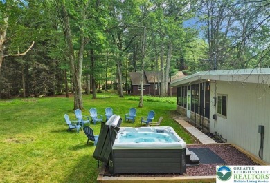 Step into this 3-bedroom, 2-bath Lake Harmony home showcasing on Split Rock Resort and Country Club in Pennsylvania - for sale on GolfHomes.com, golf home, golf lot