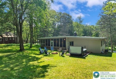 Step into this 3-bedroom, 2-bath Lake Harmony home showcasing on Split Rock Resort and Country Club in Pennsylvania - for sale on GolfHomes.com, golf home, golf lot