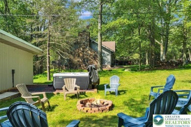 Step into this 3-bedroom, 2-bath Lake Harmony home showcasing on Split Rock Resort and Country Club in Pennsylvania - for sale on GolfHomes.com, golf home, golf lot