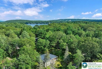 Step into this 3-bedroom, 2-bath Lake Harmony home showcasing on Split Rock Resort and Country Club in Pennsylvania - for sale on GolfHomes.com, golf home, golf lot